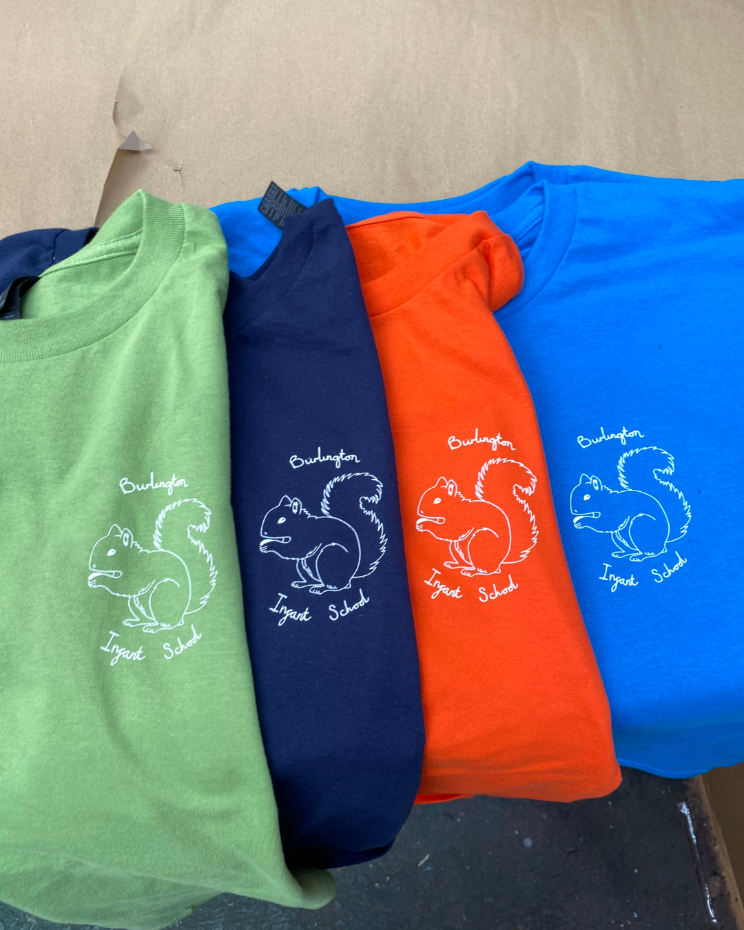 Jumper being embroidered with Gillett Flooring Logo